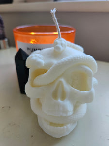 Snake skull candle